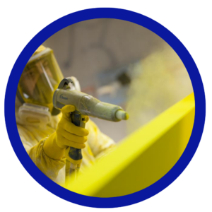 Worker Applying Yellow Powder Coating to Metal Surface