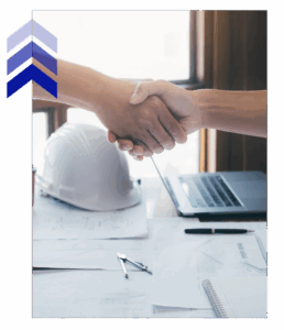 Handshake between two engineers over blueprints and helmet, symbolizing trusted fabrication for engineers