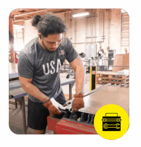 Manual Edge Finishing After Laser Cutting Process - Accurate Metal Stamping AMS operator manually preparing steel edges after laser cutting